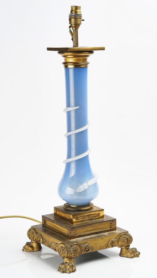 A FRENCH ORMOLU AND BLUE OPALINE GLASS MOUNTED TABLE LAMP