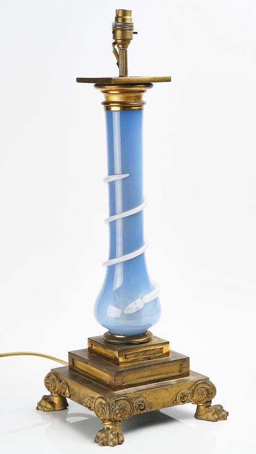 A FRENCH ORMOLU AND BLUE OPALINE GLASS MOUNTED TABLE LAMP