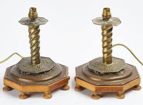A PAIR OF SWEDISH EMBOSSED BRASS CANDLESTICKS