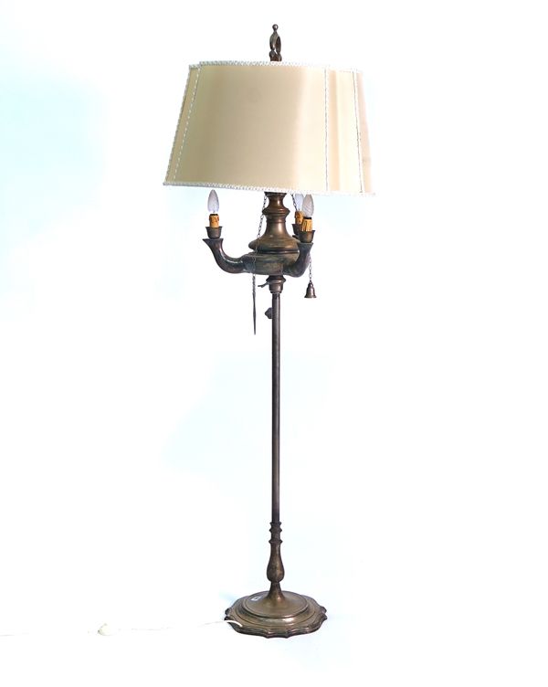 A SILVERED METAL STANDARD LAMP