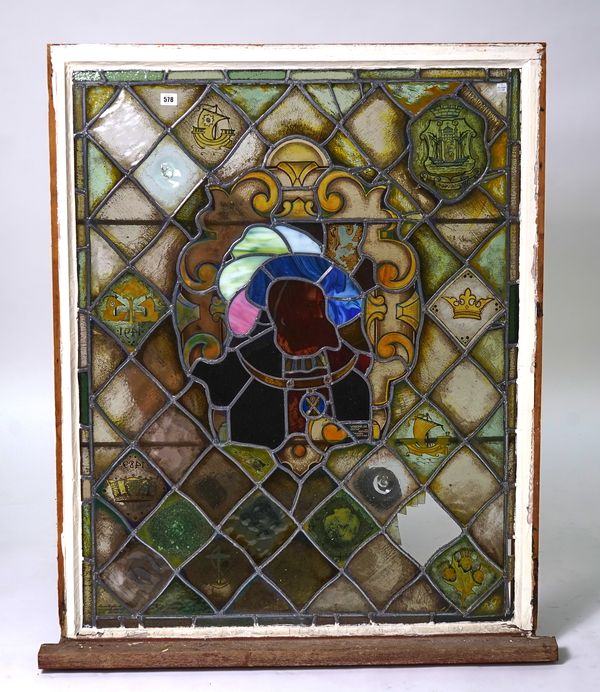 A COMMEMORATIVE STAINED AND LEADED GLASS WINDOW PANEL