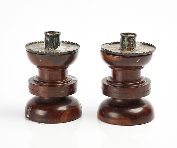 A PAIR OF EDWARDIAN SILVER MOUNTED YEW WOOD CANDLESTICKS