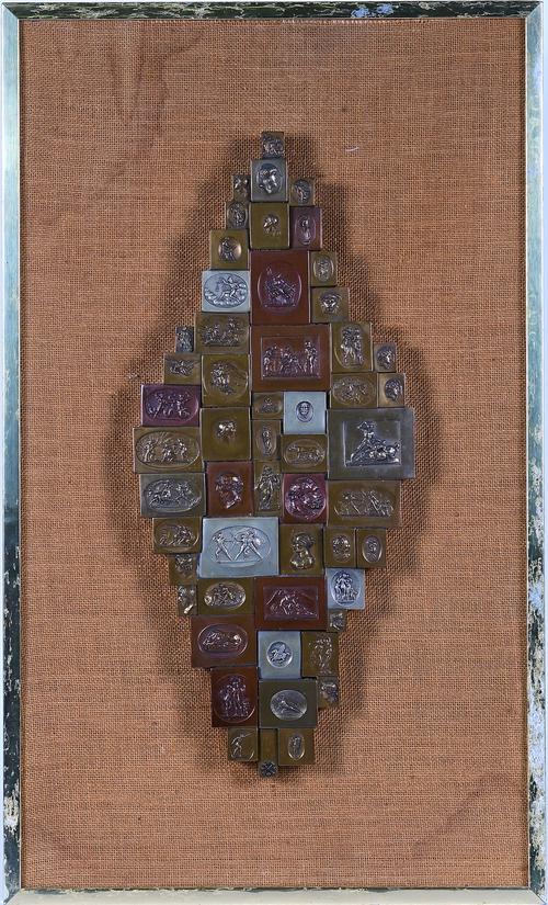 A BRONZED RESIN CAMEO WALL SCULPTURE