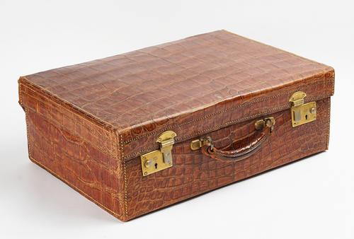A CROCODILE LEATHER SUITCASE