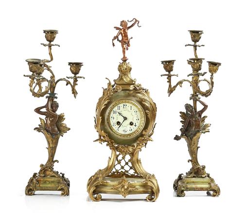 A GILT-METAL AND ONYX THREE-PIECE MANTEL CLOCK GARNITURE