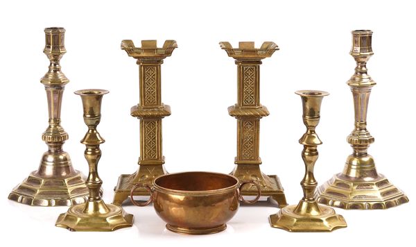 A PAIR OF DUTCH FORMERLY SILVER PLATED BRASS SOCKET CANDLESTICKS, TWO FURTHER PAIRS OF CANDLESTICKS AND A COPPER BOWL (7)