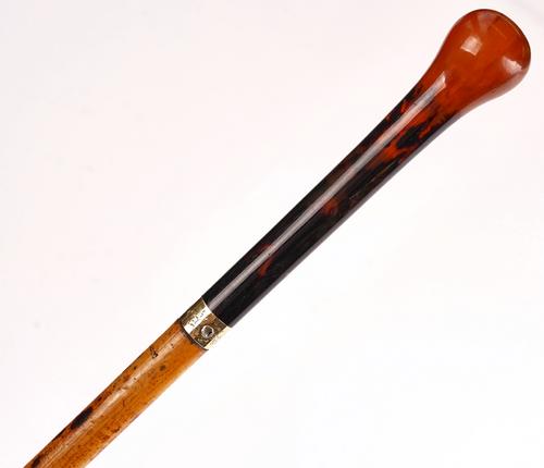 A VICTORIAN FAUX TORTOISESHELL MOUNTED MALACCA SWORD STICK