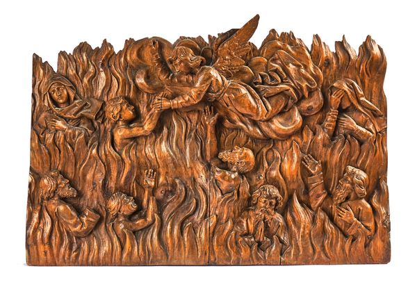 A NORTH ITALIAN CARVED PINE PANEL DEPICTING SOULS BEING PLUCKED FROM PURGATORY BY AN ANGEL