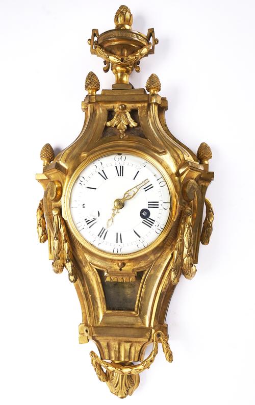 A LOUIS XVI ORMOLU STRIKING CARTEL CLOCK