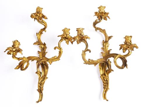 A PAIR OF LOUIS XV STYLE ORMOLU THREE BRANCH WALL LIGHTS