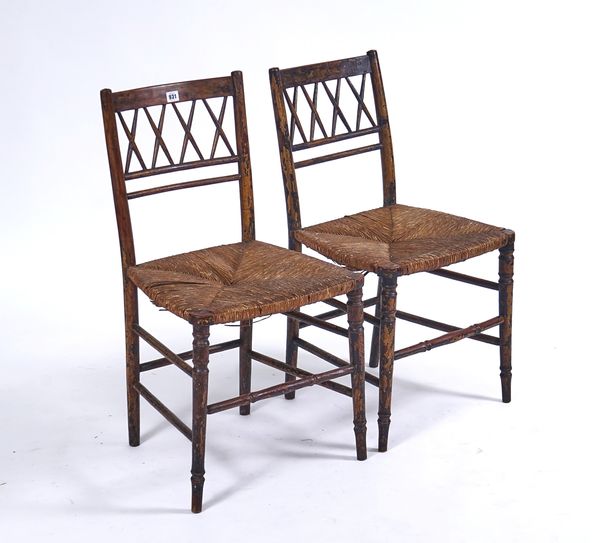 A PAIR OF REGENCY LATTICE BACK SIDE CHAIRS