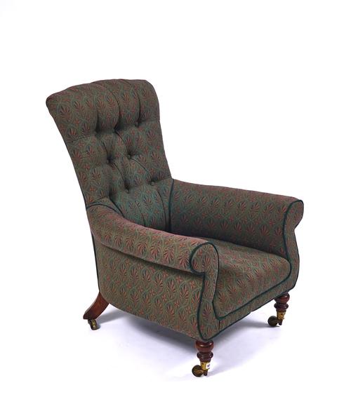 A 19TH CENTURY BUTTON BACK EASY ARMCHAIR