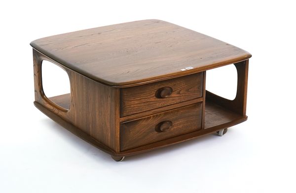 ERCOL; A PANDORA'S BOX ELM COFFEE TABLE