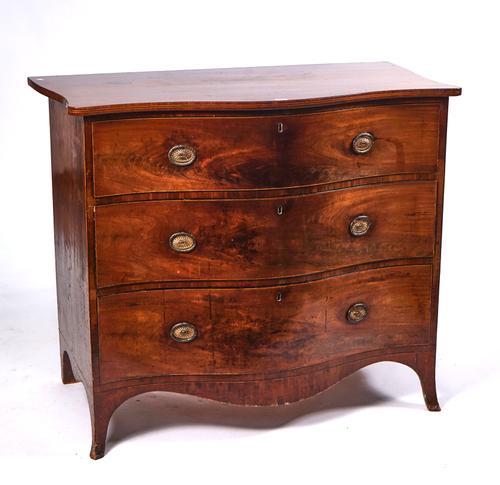A GEORGE III MAHOGANY SERPENTINE CHEST