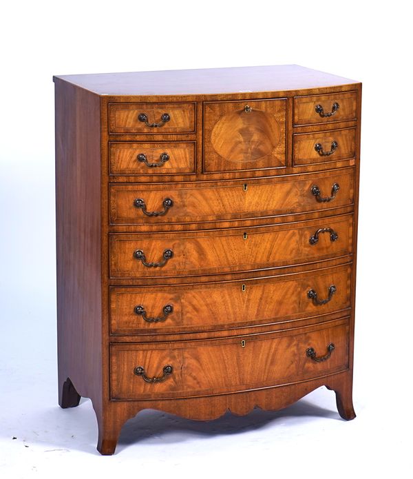 A REGENCY STYLE INLAID MAHOGANY BOWFRONT CHEST
