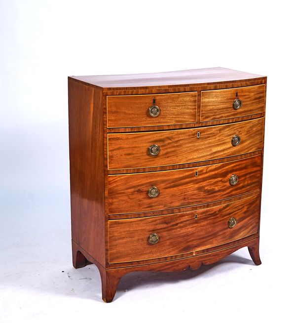 A REGENCY ROSEWOOD BANDED MAHOGANY BOWFRONT CHEST