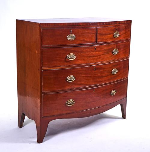 A REGENCY MAHOGANY BOWFRONT CHEST