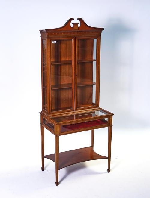 AN EDWARDIAN INLAID MAHOGANY DISPLAY CABINET