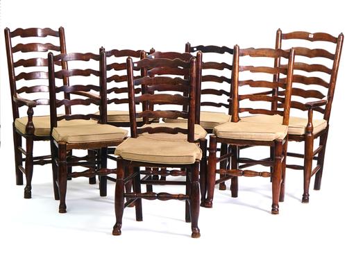 A MATCHED SET OF EIGHT LANCASHIRE LADDER BACK DINING CHAIRS