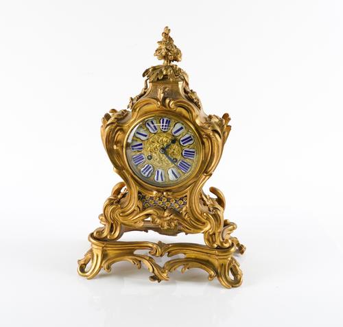 A LOUIS XV STYLE ORMOLU MANTEL CLOCK