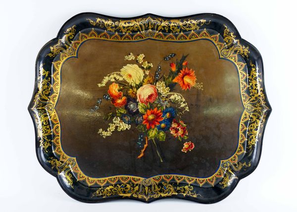 A VICTORIAN PAINTED AND GILT-HEIGHTENED PAPIER-MÂCHÉ-MACHE TRAY OF CARTOUCHE OUTLINE