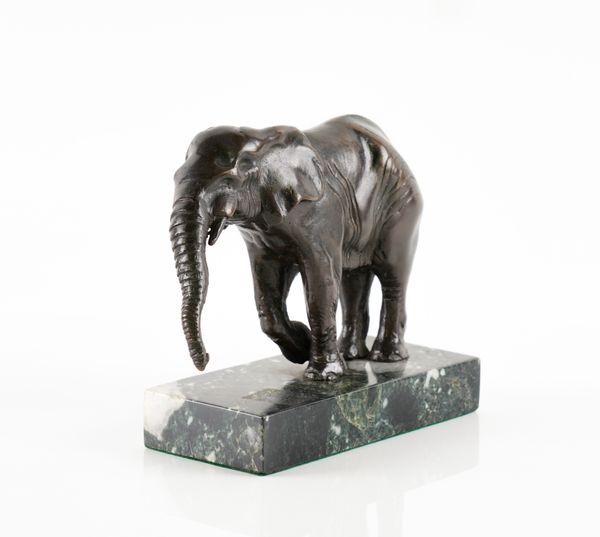 A FRENCH PATINATED BRONZE MODEL OF AN ELEPHANT