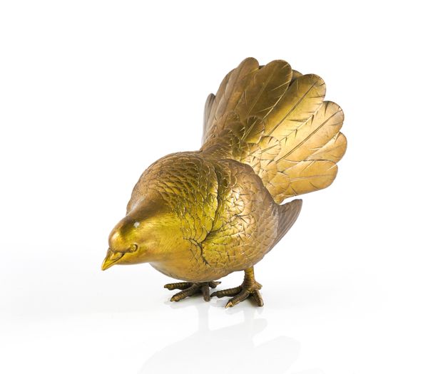 A GILT-BRONZE MODEL OF A PIGEON OR DOVE