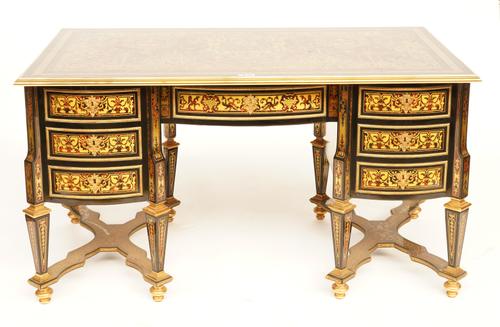 A LOUIS XIV STYLE FAUX BOULLE SEVEN DRAWER BUREAU PLAT