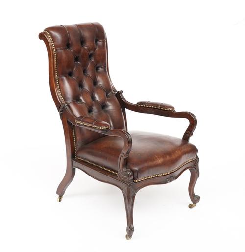 A 19TH CENTURY FRENCH ROSEWOOD FRAMED RECLINING OPEN ARM EASY CHAIR