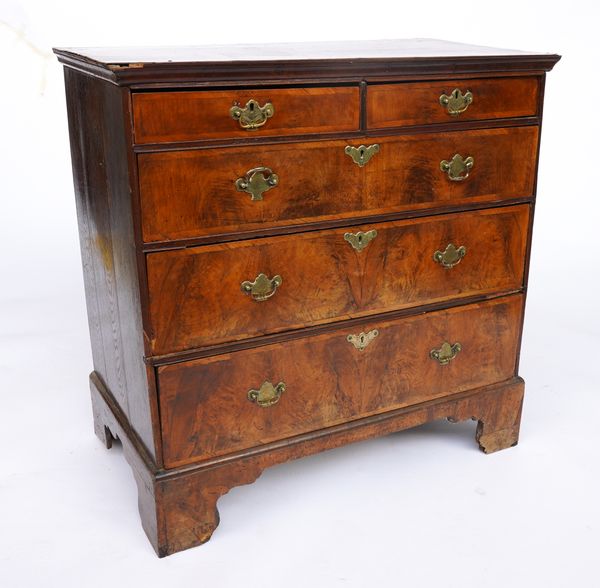 A GEORGE II STYLE CROSS-BANDED WALNUT CHEST OF DRAWERS