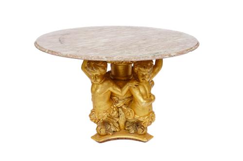 A CIRCULAR MARBLE TOPPED CENTRE TABLE