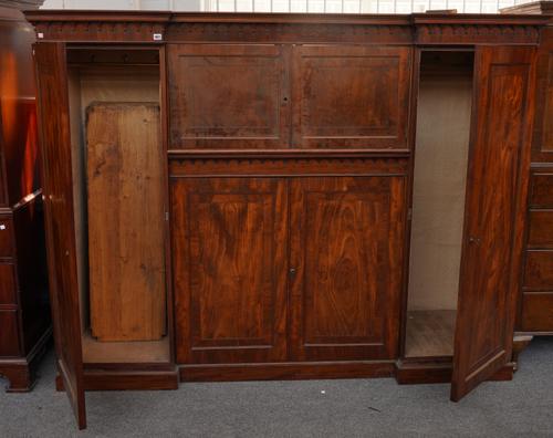 A VICTORIAN MAHOGANY INVERTED BREAKFRONT COMPACTUM WARDROBE