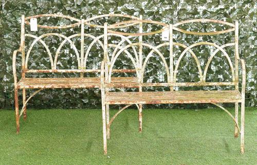 A PAIR OF REGENCY STYLE STRAP IRON GARDEN BENCHES (2)