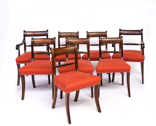 A SET OF EIGHT REGENCY MAHOGANY ROPE BACK DINING CHAIRS (8)