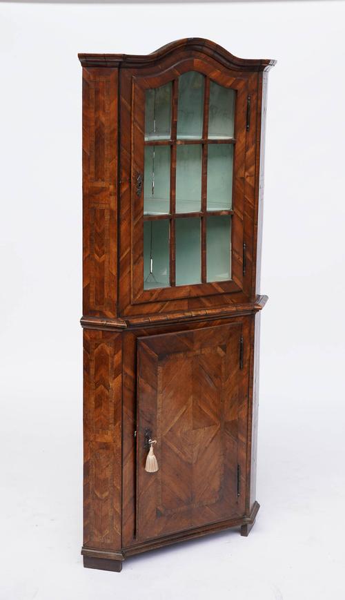 POSSIBLY MALTESE; AN 18TH CENTURY FRUITWOOD FLOOR STANDING CORNER DISPLAY CABINET/CUPBOARD