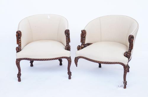 AFTER FOURNIER; A PAIR OF MAHOGANY CARVED ROPE TWIST FRAME EASY CHAIRS (2)