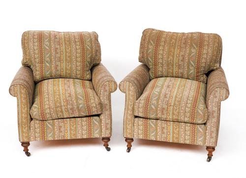 A PAIR OF PAISLEY UPHOLSTERED EASY ARMCHAIRS ON TURNED WALNUT SUPPORTS (2)