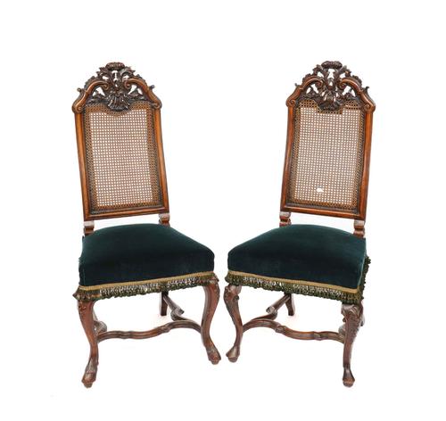 A MATCHED PAIR OF 18TH CENTURY DUTCH CARVED WALNUT SIDE CHAIRS (2)