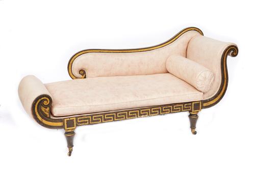 A REGENCY FAUX ROSEWOOD PARCEL GILT SCROLL END CHAISE LONGUE