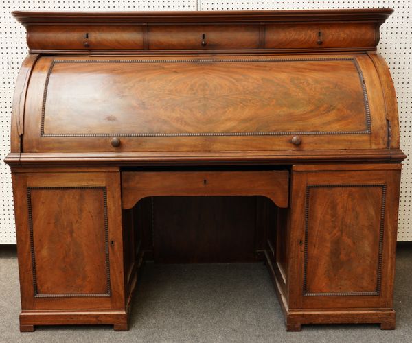 A 19TH CENTURY FRENCH MAHOGANY TWIN PEDESTAL CYLINDER BUREAU