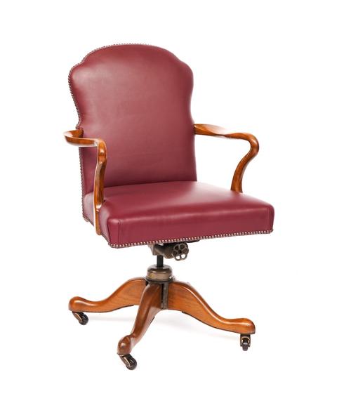HILLCREST; A LEATHER UPHOLSTERED OPEN ARM DESK SWIVEL CHAIR