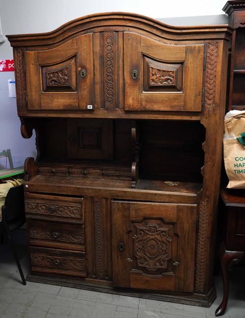 A 19TH CENTURY SWISS DOME TOP WALNUT DRESSER