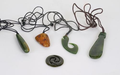 FOUR MAORI JADE PENDANTS