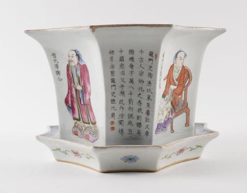 A CHINESE FAMILLE-ROSE `WU SHUANG PU' HEXGAONAL JARDINIERE AND STAND