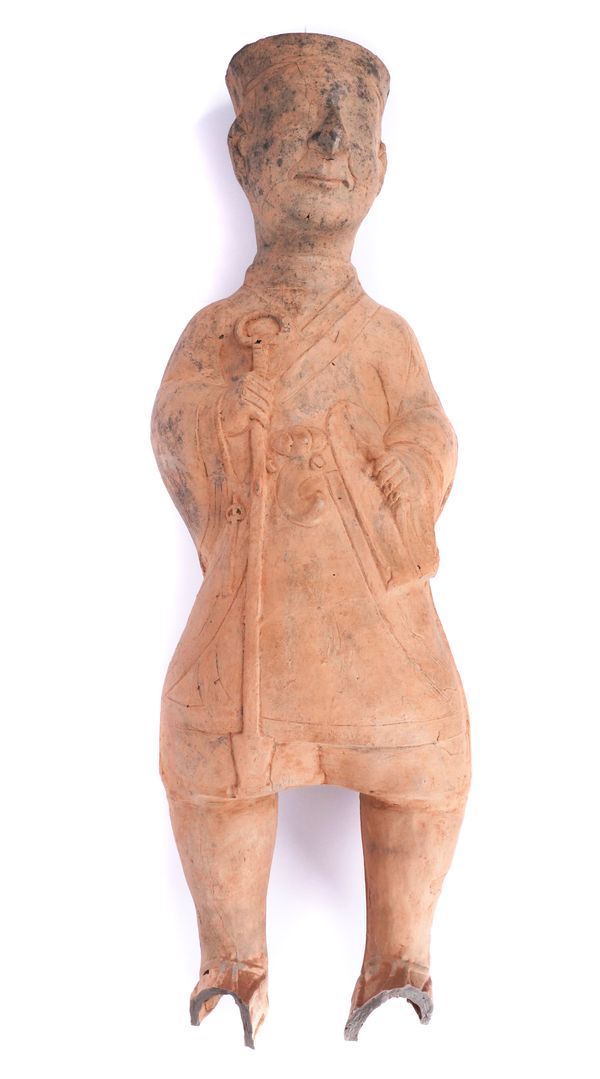 A LARGE CHINESE SICHUAN-STYLE POTTERY FIGURE OF A FARMER