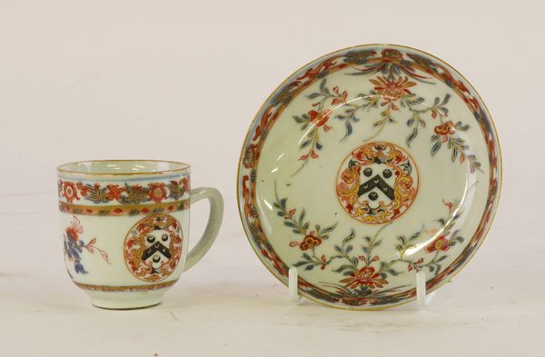 A CHINESE IMARI ARMORIAL COFFEE CUP AND SAUCER (2)