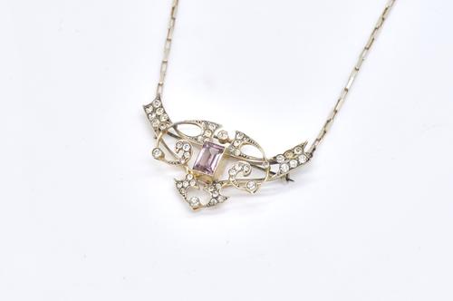 A SILVER, MAUVE AND COLOURLESS PASTE PENDANT NECKLACE/BROOCH