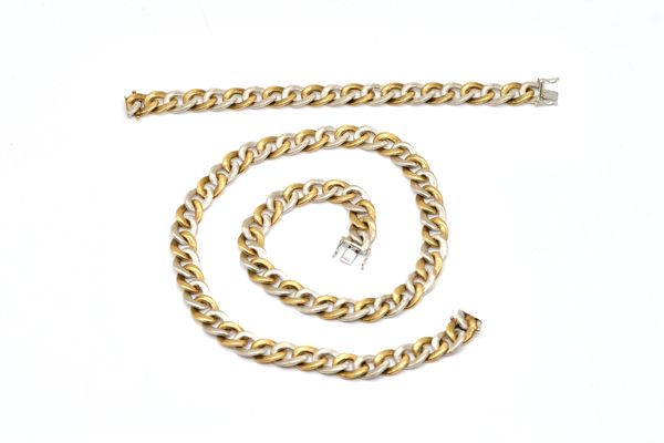 A 9CT TWO COLOUR GOLD CURB LINK NECKCHAIN WITH A MATCHING BRACELET (2)