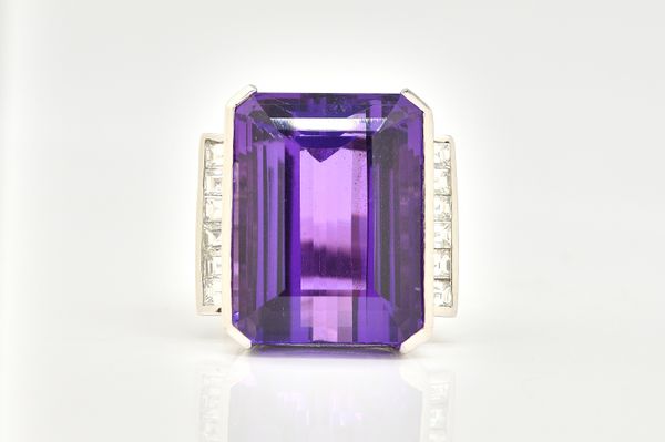 A WHITE GOLD, AMETHYST AND DIAMOND RING
