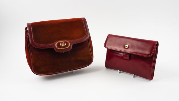 GUCCI: A RED SUEDE AND LEATHER CROSS BODY BAG AND ANOTHER RED LEATHER CLUTCH BAG (2)